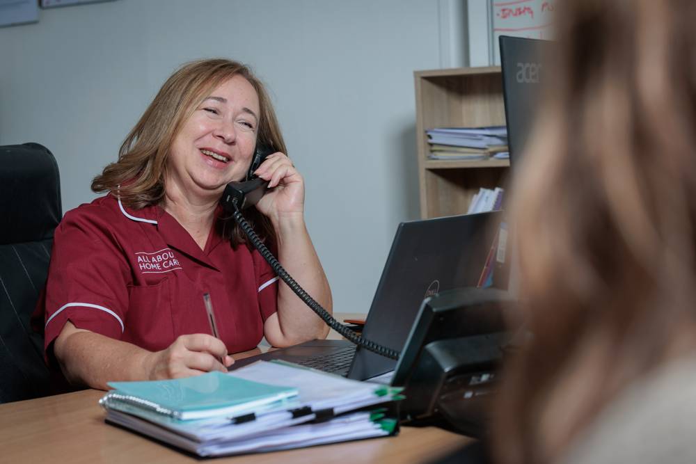 A member of the office team on the phone